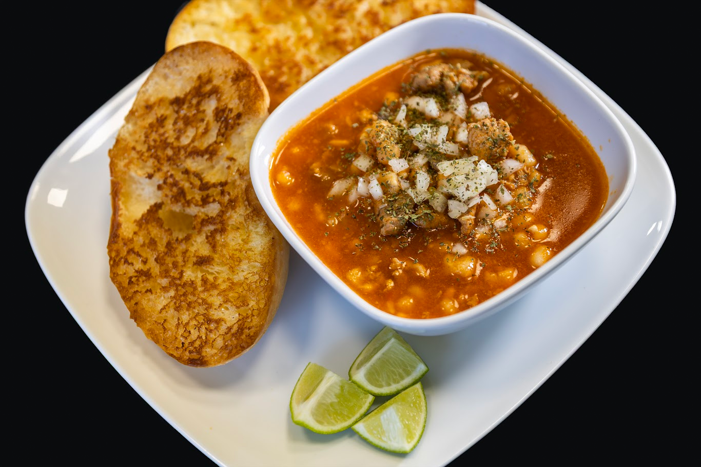 Pozole with toast and lime